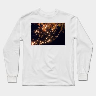 Lights draping off the Tree with a Black Sky in the background Long Sleeve T-Shirt